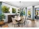 Bright dining area boasts abundant natural light, stylish décor, and an inviting atmosphere at 5515 S Caisson Way, Mesa, AZ 85212