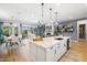 Open-concept kitchen and dining room with natural light and views of the outdoor space at 5515 S Caisson Way, Mesa, AZ 85212