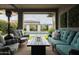 Inviting outdoor living space with comfortable seating, fire table, and a view of the refreshing pool at 5515 S Caisson Way, Mesa, AZ 85212