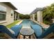 A luxurious backyard pool with lounge chairs, perfect for relaxation and outdoor living, is highlighted at 5515 S Caisson Way, Mesa, AZ 85212