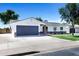 Attractive single-story residence with a well-manicured lawn and a spacious two-car attached garage at 640 S 34Th St, Mesa, AZ 85204