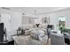 Bright and open living area featuring an elegant chandelier and hardwood floors at 640 S 34Th St, Mesa, AZ 85204