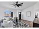 Cozy living space offers a large window, comfortable seating, and hardwood floors at 640 S 34Th St, Mesa, AZ 85204