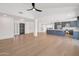 Spacious open-concept living space with modern fixtures and hardwood floors at 6620 E Paradise Ln, Scottsdale, AZ 85254