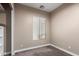 Bedroom with plush carpet, window with blinds, and neutral paint at 6805 S Sapphire Way, Chandler, AZ 85249
