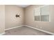 Neutral bedroom with carpet, window with blinds, and wall mount TV bracket at 6805 S Sapphire Way, Chandler, AZ 85249