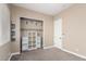 Bedroom featuring carpet floors, a door to the hallway, and a walk-in closet at 6805 S Sapphire Way, Chandler, AZ 85249