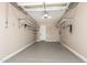 Clean, well-lit garage with epoxy flooring and organized storage solutions at 6805 S Sapphire Way, Chandler, AZ 85249