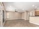 Bright living room featuring neutral colors, a ceiling fan, and tiled floors at 6805 S Sapphire Way, Chandler, AZ 85249