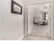 Hallway view to the bedroom features neutral walls and decor to the inviting space at 6958 W Morning Dove Dr, Glendale, AZ 85308