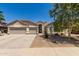 Charming single-story home with a well-manicured front yard and a welcoming entrance at 6958 W Morning Dove Dr, Glendale, AZ 85308
