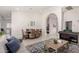 Spacious living area featuring a large table and an open floor plan with tile flooring at 6958 W Morning Dove Dr, Glendale, AZ 85308
