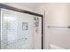 Modern bathroom with sleek glass shower and subway tile, perfect for a spa-like experience at 7110 N 28Th Dr, Phoenix, AZ 85051
