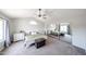 Spacious bedroom with vaulted ceiling, ceiling fan, closet with mirrored doors, and trunk at 7110 N 28Th Dr, Phoenix, AZ 85051