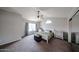 Bright bedroom featuring vaulted ceiling, window with curtains, and chest at 7110 N 28Th Dr, Phoenix, AZ 85051