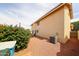 Two-story house exterior features gravel, an AC unit, and a rose bush at 7110 N 28Th Dr, Phoenix, AZ 85051