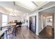 Well-lit kitchen featuring stainless steel refrigerator, open to a dining space, and other areas of the home at 7110 N 28Th Dr, Phoenix, AZ 85051