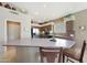 A kitchen featuring a large island with seating, stainless steel appliances, and ample counter space at 7307 E Black Rock Rd, Scottsdale, AZ 85255