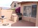 The outdoor BBQ area features tile accents, a built-in grill, and pavers, perfect for entertaining guests at 8008 W Ross Ave, Peoria, AZ 85382