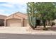 Charming single-Gathering home with a three-car garage, desert landscaping, and well-manicured front yard at 8008 W Ross Ave, Peoria, AZ 85382