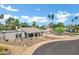 Eye-catching single-story home with desert landscaping, circular driveway, and a two car garage at 8936 N 80Th Pl, Scottsdale, AZ 85258