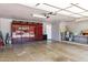 Spacious garage featuring built-in storage cabinets and ample room for vehicles at 8936 N 80Th Pl, Scottsdale, AZ 85258