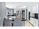 Bright, modern kitchen with stainless steel appliances, sleek countertops, and breakfast bar at 8936 N 80Th Pl, Scottsdale, AZ 85258