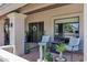 Cozy front patio with comfortable seating and potted plants at 8936 N 80Th Pl, Scottsdale, AZ 85258
