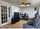 Functional bonus room with a comfortable seating area and desk at 9221 N 48Th Dr, Glendale, AZ 85302