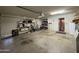 Spacious garage with shelving and plenty of room for storage and parking at 9221 N 48Th Dr, Glendale, AZ 85302