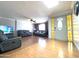 Spacious living room featuring hardwood floors and a decorative front door at 9221 N 48Th Dr, Glendale, AZ 85302