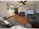 Comfortable living room with hardwood floors and cozy seating areas at 9221 N 48Th Dr, Glendale, AZ 85302