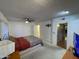 A look at the primary bedroom featuring a ceiling fan, carpet, and ample space at 9221 N 48Th Dr, Glendale, AZ 85302