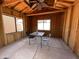 Empty enclosed patio with new construction and multiple windows to the backyard at 9221 N 48Th Dr, Glendale, AZ 85302