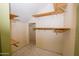 Walk-in closet with hanging rods and shelving at 937 E 6Th Ave, Mesa, AZ 85204