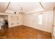 Spacious dining room with classic chandelier, built-in cabinets and wood floors at 937 E 6Th Ave, Mesa, AZ 85204