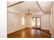 Bright dining room features hardwood floors, classic chandelier, and French doors at 937 E 6Th Ave, Mesa, AZ 85204