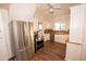 Well-lit kitchen features stainless steel appliances, ample counter space, and new hardwood floors at 937 E 6Th Ave, Mesa, AZ 85204