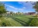 Manicured community green space with a covered picnic and barbecue area at 9535 E Tupelo Ave, Mesa, AZ 85212