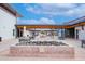 Inviting outdoor courtyard features comfortable seating areas, stylish decor, and open-air ambiance at 9535 E Tupelo Ave, Mesa, AZ 85212