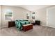 Bright main bedroom with large windows, neutral carpeting, and a comfortable, classic design at 9535 E Tupelo Ave, Mesa, AZ 85212