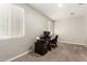 Neutral-toned office space with carpet and large windows for ample natural light at 9535 E Tupelo Ave, Mesa, AZ 85212