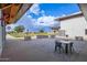 Community park featuring picnic tables and barbecue, with a vibrant green lawn for outdoor activities at 9535 E Tupelo Ave, Mesa, AZ 85212