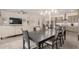 Elegant dining area open to the living room and kitchen, ideal for entertaining at 1026 N 152Nd Ave, Goodyear, AZ 85338
