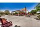 Shaded community playground featuring a play structure and picnic tables at 1026 N 152Nd Ave, Goodyear, AZ 85338