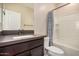 Bathroom featuring a shower-tub combination, vanity, and mirror at 1153 W Diamondback Dr, Chandler, AZ 85286
