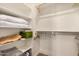 Walk-in closet with shelving and plenty of room for storage at 1153 W Diamondback Dr, Chandler, AZ 85286