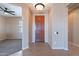 Welcoming home foyer with tile flooring, neutral paint, and a view to the living room at 12910 W Junipero Dr, Sun City West, AZ 85375