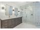 Stylish bathroom featuring dual vanities and a spacious walk-in shower at 1311 N Congress Dr, Chandler, AZ 85226