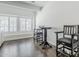 Breakfast nook featuring hardwood floors and plantation shutters at 1311 N Congress Dr, Chandler, AZ 85226